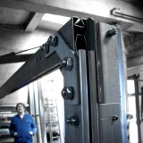 Corner construction of a height-adjustable door seal (TAD)